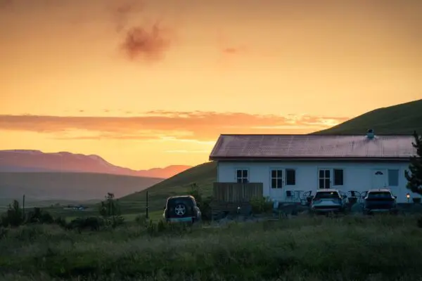 8-day self-drive tour in Iceland, Icelandic farm during sunset.