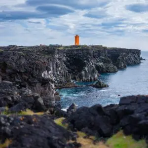 8-Day Self-Drive Tour with South Coast, Golden Circle, Landmannalaugar, Snaefellsnes & Westfjords, orange lighthouse.