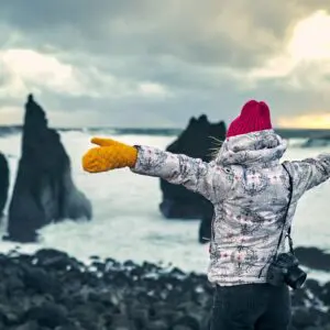 10-Day Winter Ring Road Tour Around Iceland, women close to the shore.