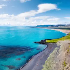 15-Day Self-Drive Tour around Iceland, shore in a sunny day.