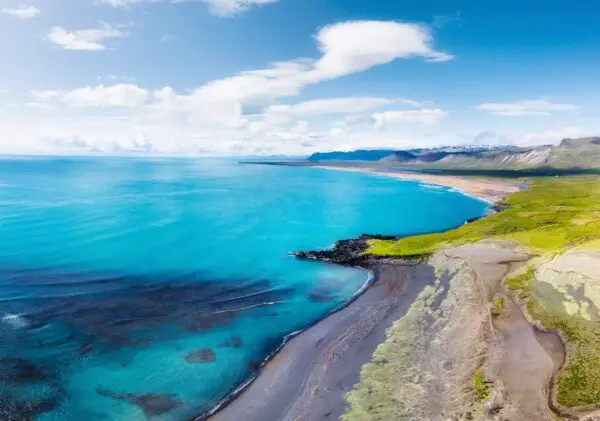 15-Day Self-Drive Tour around Iceland, shore in a sunny day.