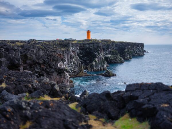 8-Day Self-Drive Tour with South Coast, Golden Circle, Landmannalaugar, Snaefellsnes & Westfjords, orange lighthouse.