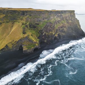 9-day self-drive tour around Iceland, cliffs on Reynisfjara black beach.