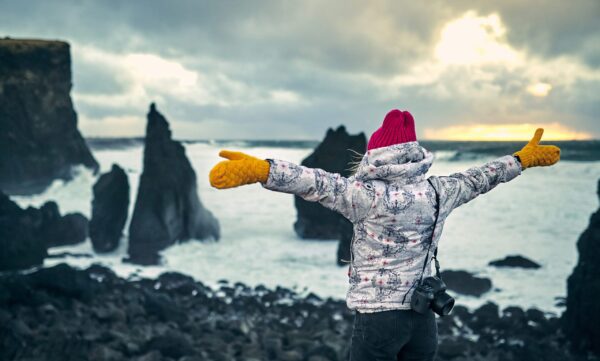 10-Day Winter Ring Road Tour Around Iceland, women close to the shore.