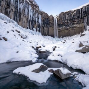 10-Day Winter Ring Road Tour Around Iceland, Svartifoss waterfall.