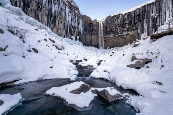 10-Day Winter Ring Road Tour Around Iceland, Svartifoss waterfall.